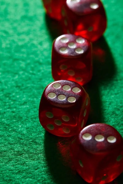Live Casino Hold'em table with dealer and community cards displayed on screen